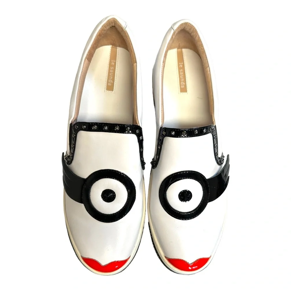White Leather Slip-On Sneakers with Black Trim and Red Accent